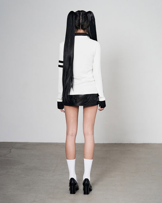 EMBOSSED MICRO PLEATED SKIRT BLACK